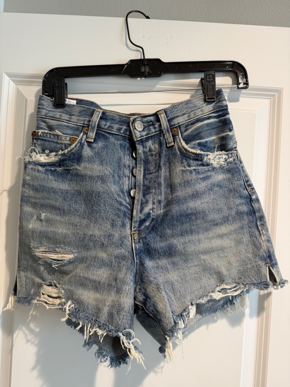Agolde Distressed High-Rise Jean Shorts in Faded Blue